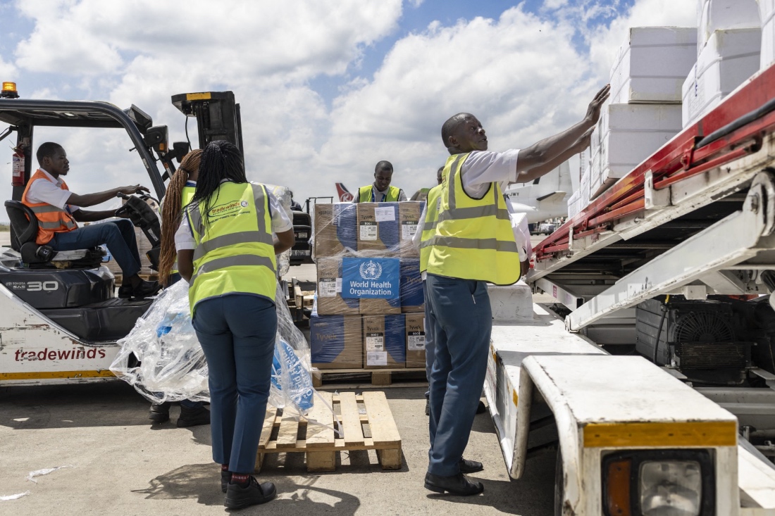 Ground crew load medical supplies onto a UN Humanitarian Air Service operated charter plane bound for Bunia at Jomo Kenyatta International Airport in Nairobi, Kenya. (AFP)