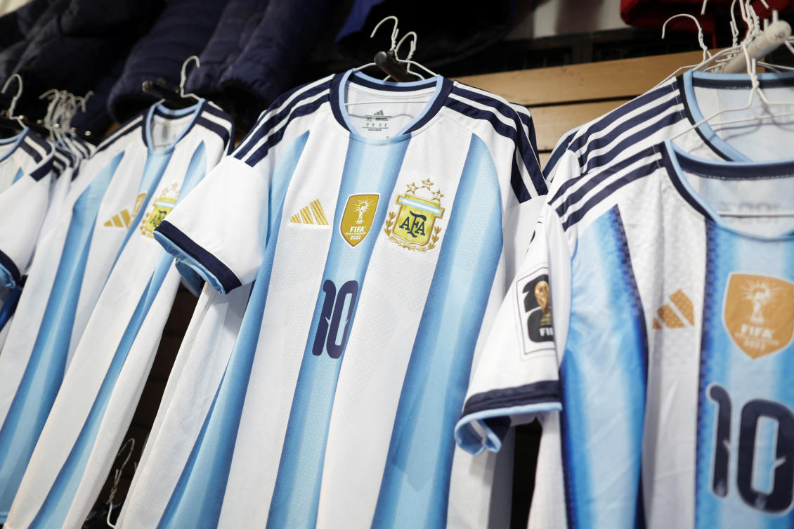 Argentina national soccer team unauthorized replica jerseys are displayed for sale at a street shop, as World Cup fever in Argentina boosts sales of fake merchandise while inflation and sluggish economic activity make it harder for fans to buy original goods, in Buenos Aires, May 26, 2026. (Reuters)