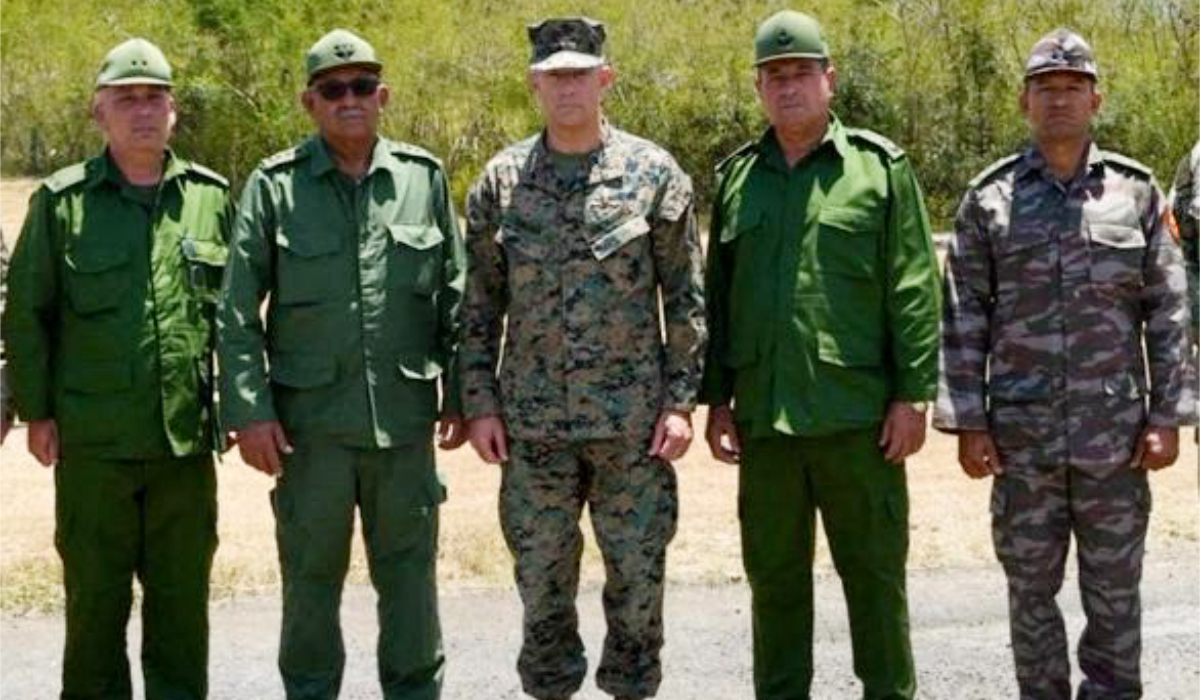 SOUTHCOM Commander General Francis L. Donovan (C), the Chief of the General Staff and First Deputy Minister of Cuba's Revolutionary Armed Forces (MINFAR) General Roberto Legra Sotolongo (2nd/L) and other Cuban military officials, during their meeting at the perimeter of the US Naval Station in Guantanamo Bay, Cuba, on May 29, 2026. (AFP)