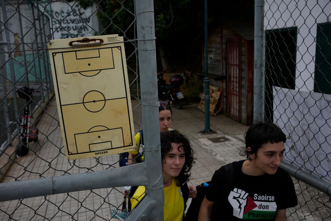 Greek athletes of Fostiras Kaisarianis arrive before a semifinal match against Cameroon during the Kypseli Mundial in Athens, on May 24, 2026. (AP)