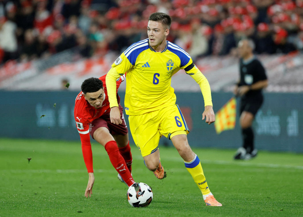 Sweden’s Emil Holm in action with Switzerland’s Ruben Vargas during their — FIFA World Cup — UEFA Qualifiers — Group B — match at Stade de Geneve, Geneva, on Nov. 15, 2025. (Reuters/File)