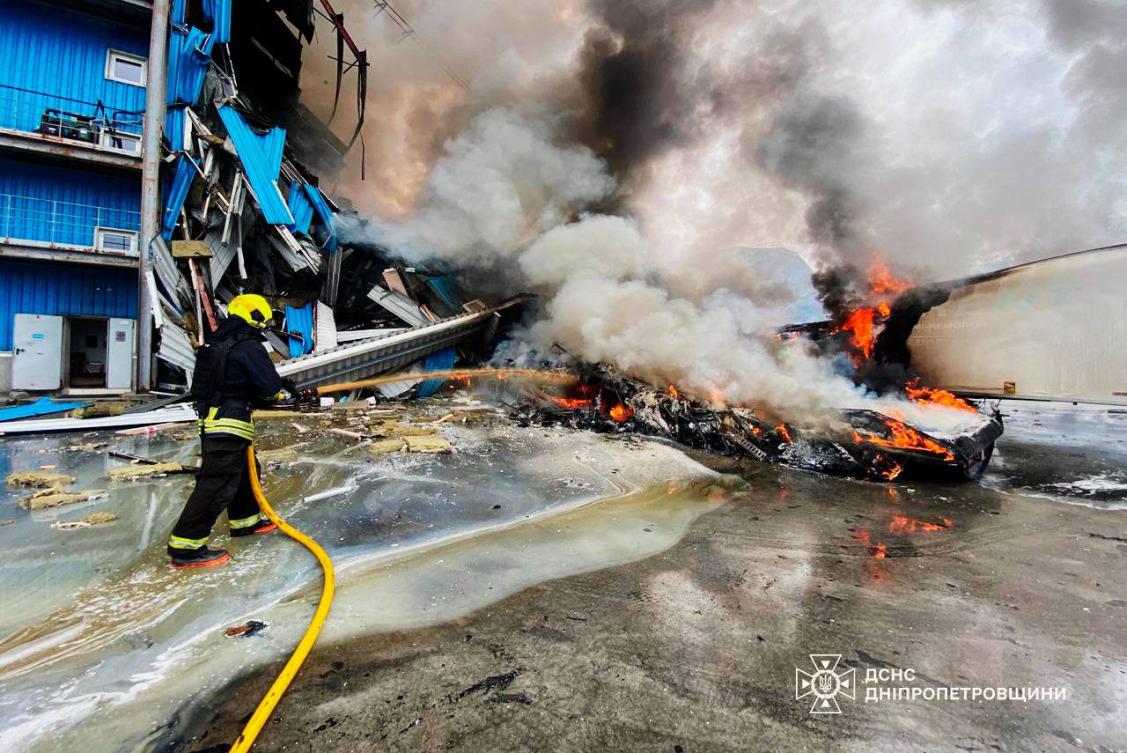 A Ukrainian firefighter extinguishes a blaze at the site of a Russian air attack in Dnipro on Sunday. (AFP)