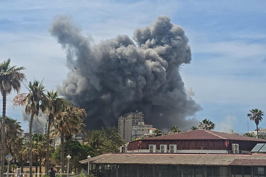 Smoke rises from the site of an Israeli strike in the southern Lebanese city of Tyre on Sunday. (AFP)