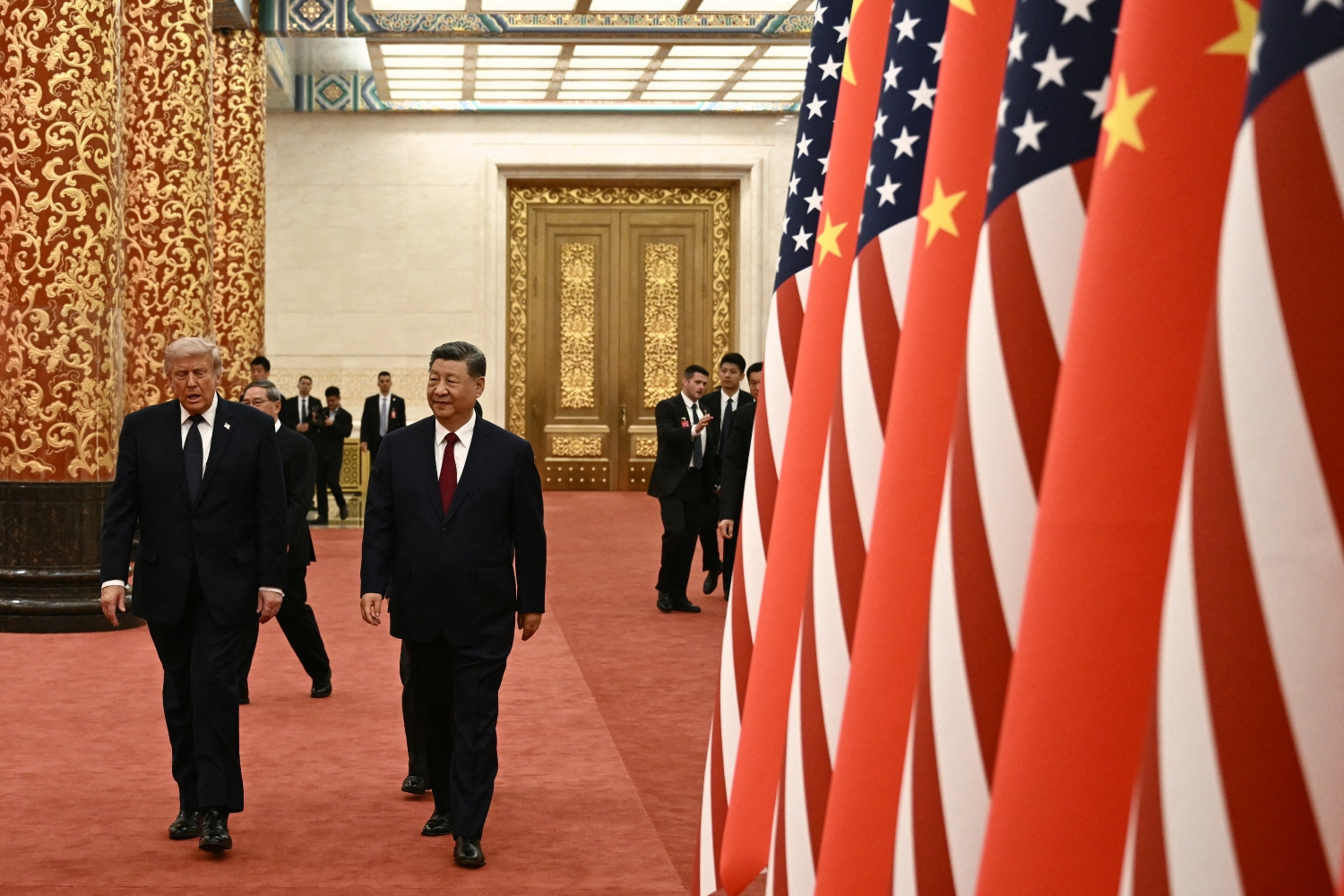 Trump’s visit to China appeared to be more about a declining empire attempting to manage its own contraction (File/AFP)