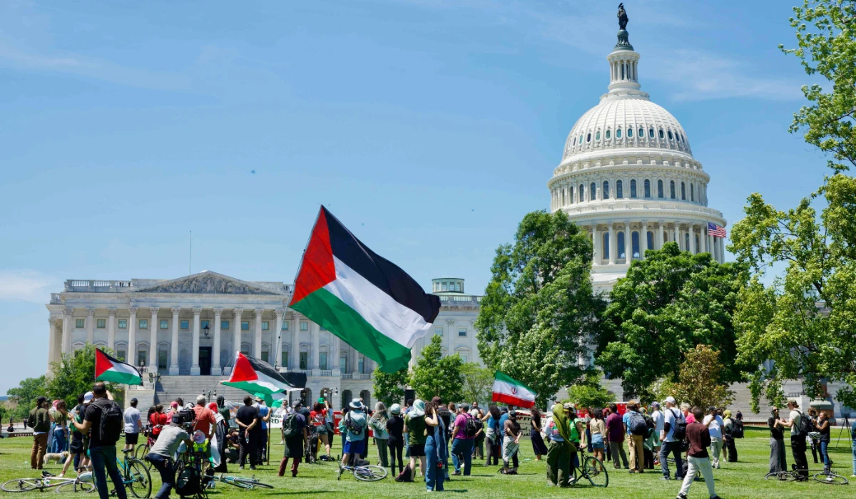 People gather near the US Capitol after participating in a Nakba solidarity bike ride in Washington, DC, on May 16, 2026. (AFP)