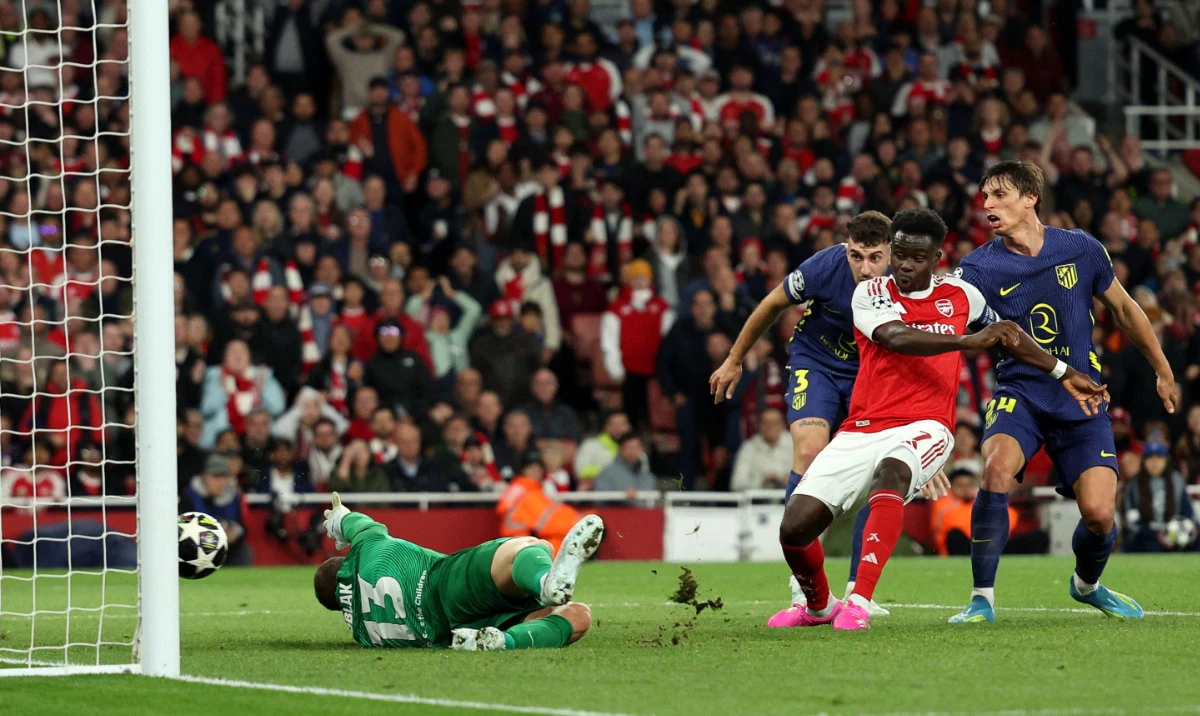 Saka sends Arsenal past Atletico into Champions League final