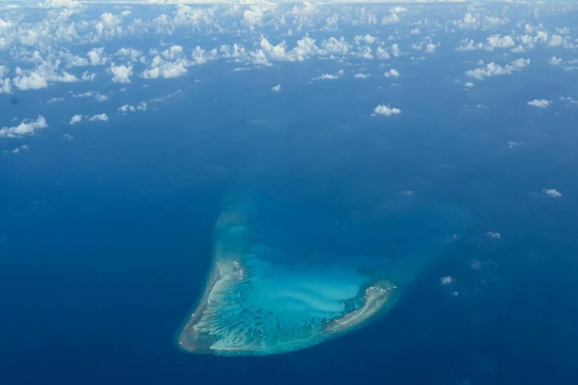 Philippines warns Chinese research ship in disputed waters