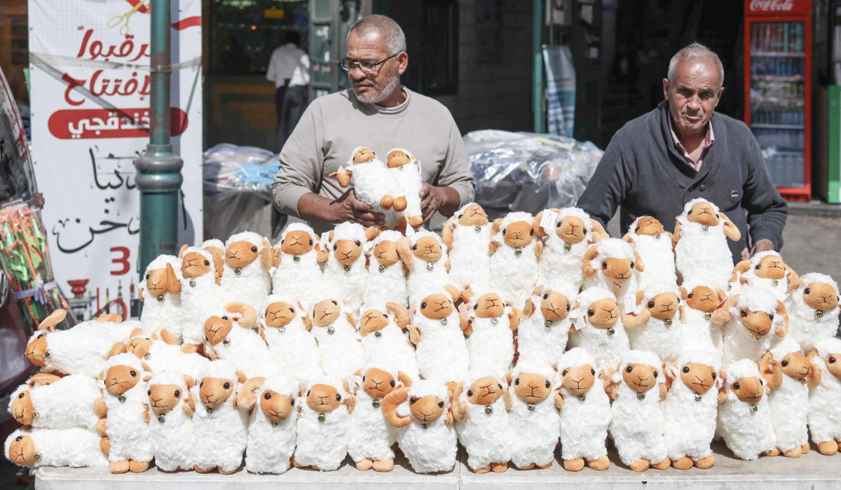 A vendor displays stuffed sheep toys outside his shop in Nablus on Tuesday. (AFP)