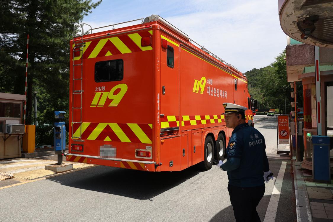 A vehicle of the National Fire Agency enters the main gate at the Hanwha Aerospace plant in Daejeon on June 1, 2026, after a reported explosion. (AFP)