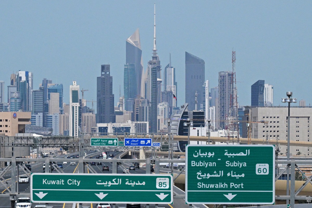 Vehicles drive along the highway in Kuwait City on April 29, 2026. (AFP)