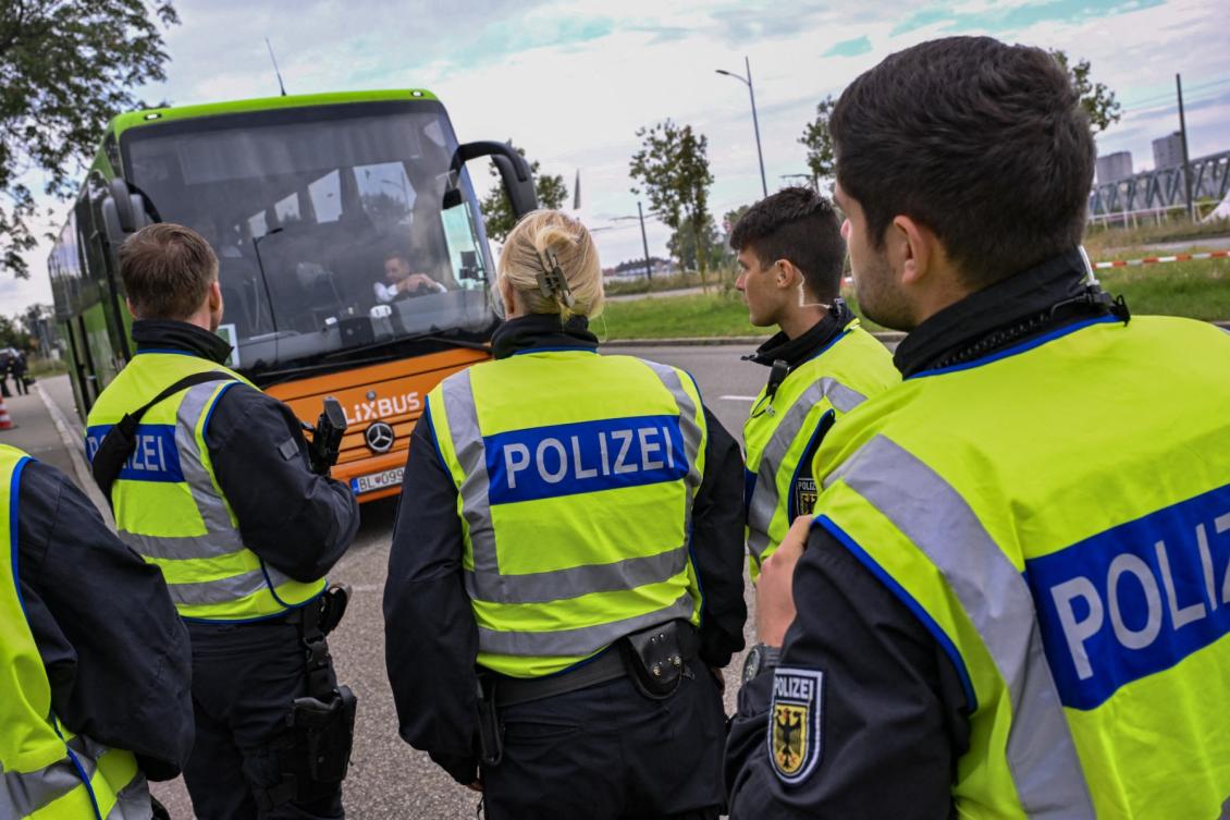 German police officers controls a long distance bus on the German/French border in Kehl, western Germany, on September 16, 2024. (File/AFP)