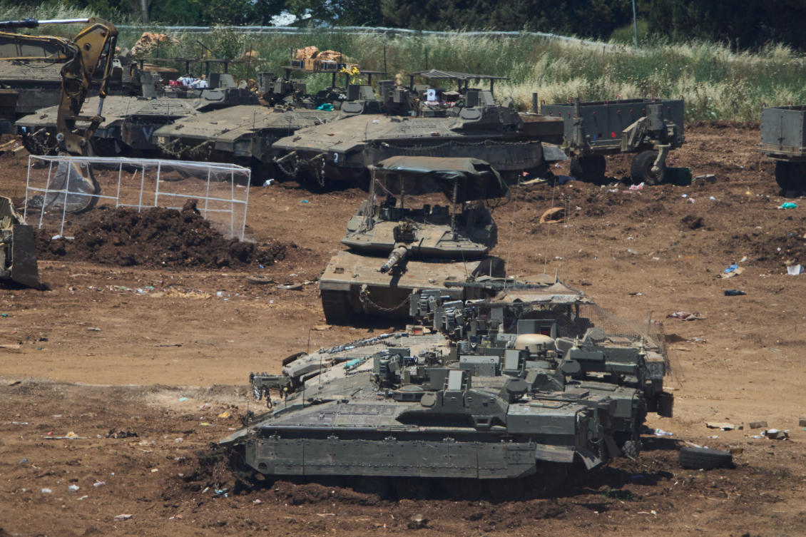 Israeli tanks on the border with Lebanon in northern Israel on Tuesday (AP)