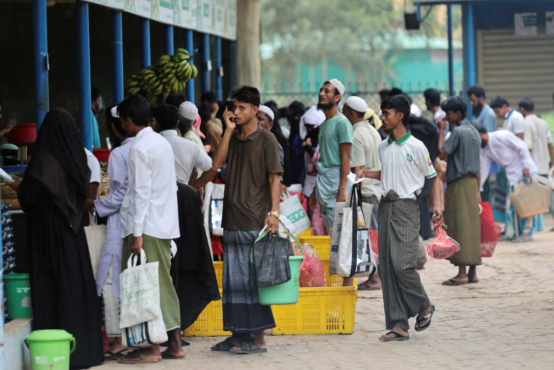 Rohingya refugees queue to receive rations from the World Food Program (WFP), at a refugee camp in Cox’s Bazar, Bangladesh, Apr. 18, 2026. (Reuters)