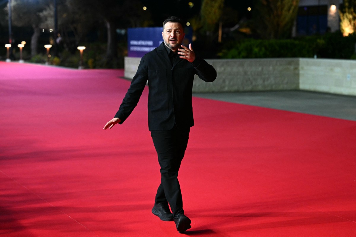 Ukraine’s President Volodymyr Zelensky walks upon his arrival ahead of an informal meeting of the European Council, in Ayia Napa, Apr. 23, 2026. (AFP)