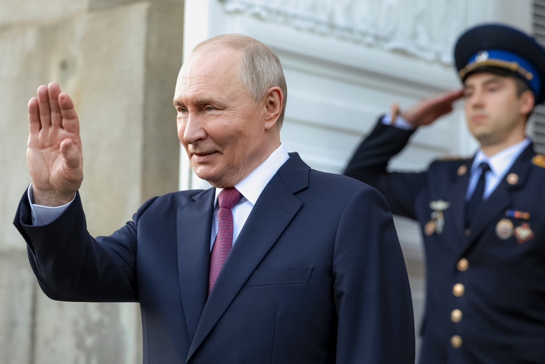 Russian President Vladimir Putin waves to Tanzanian President Samia Suluhu Hassan as she leaves the Grand Kremlin Palace of the Kremlin in Moscow, Russia. (AP)