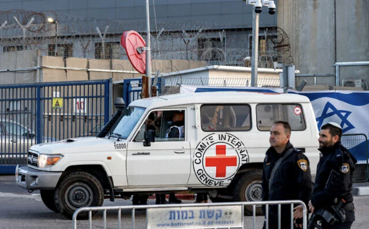 A vehicle of the International Committee of the Red Cross arrives outside Ofer military prison, located between Ramallah and Beitunia in the West Bank, on January 19, 2025. (AFP)