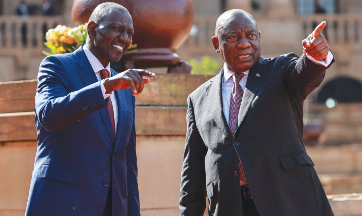 South Africa’s President Cyril Ramaphosa with Kenya’s President William Ruto in Pretoria on Thursday. (AFP)