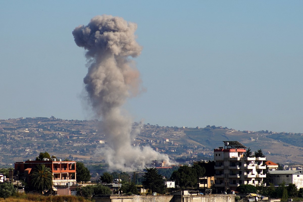 A photograph taken from the southern area of Nabatieh shows smoke rising from the site of an israeli airstrike in the village of Zawtar al-Sharkiyeh, Lebanon. (AFP)
