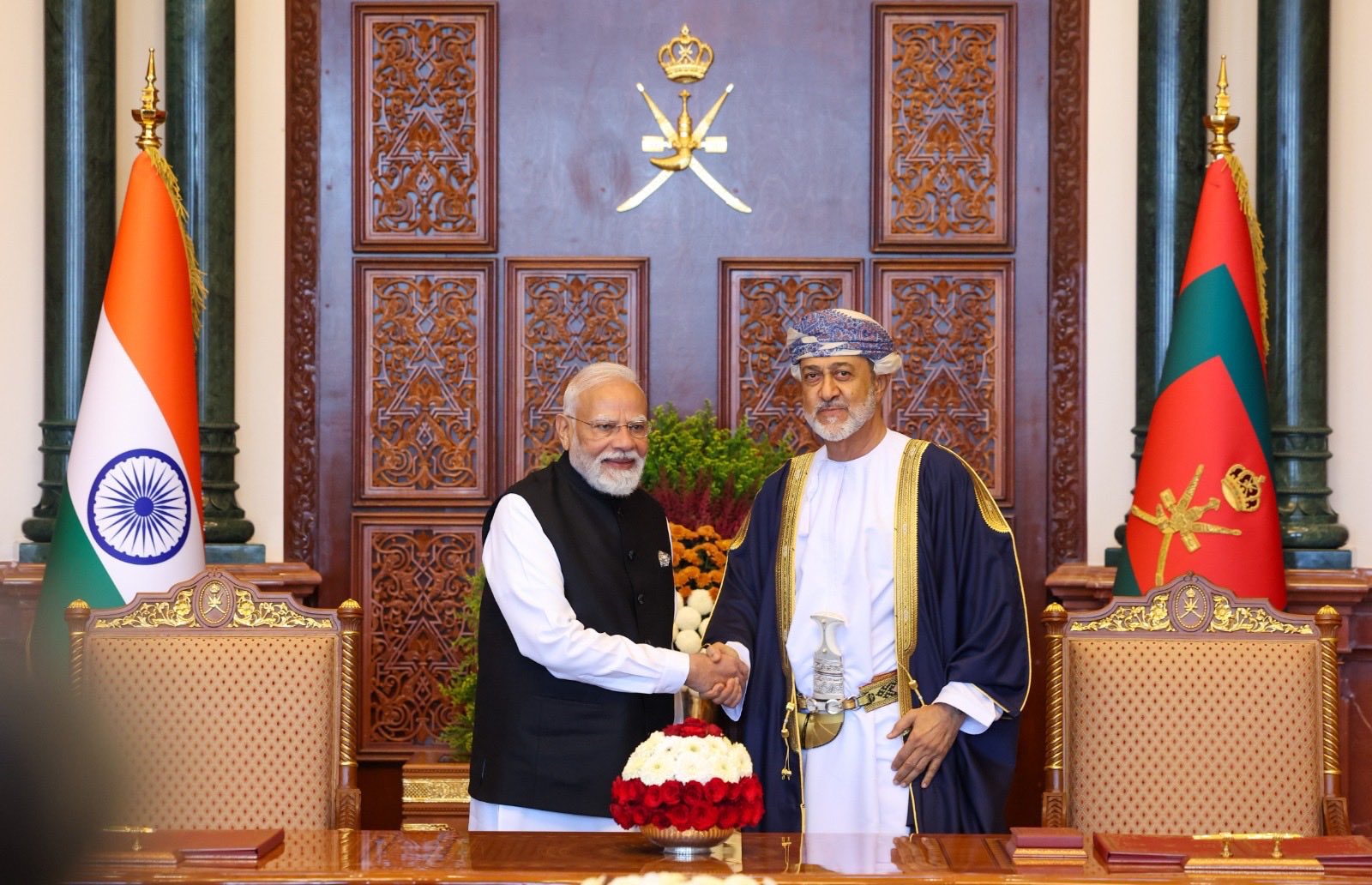 Indian Prime Minister Narendra Modi and the ruler of Oman, Haitham bin Tariq, shake hands during a signing ceremony for the India-Oman Comprehensive Economic Partnership Agreement in Muscat, Oman on Dec. 18, 2025. (India’s Ministry of Commerce and Industry)
