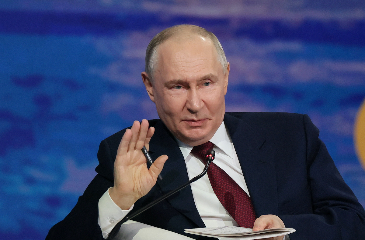 Russia's President Vladimir Putin attends a plenary session of the St. Petersburg International Economic Forum (SPIEF) in St Petersburg on Friday. (Reuters)