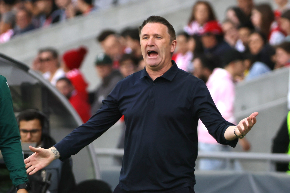 Football fans urge red card for coach who led Israeli club