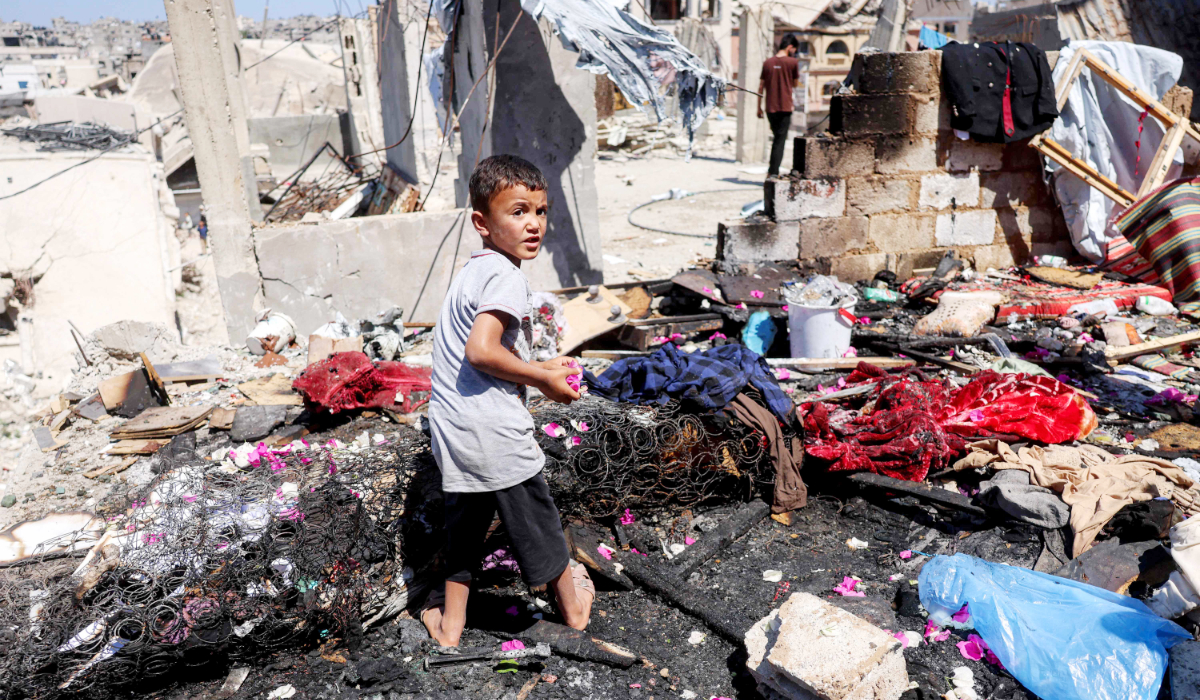 A boy inspects the aftermath of Israeli bombardment in Khan Yunis in the southern Gaza Strip on June 6, 2026. (AFP)