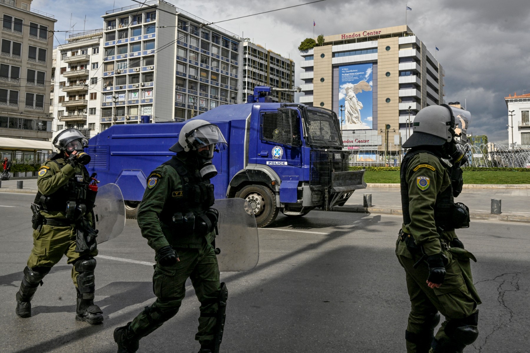 Greek riot police chase protestors during a demonstration in Athens on March 5, 2023, following Greece's worst rail accident late on February 28. (AFP)