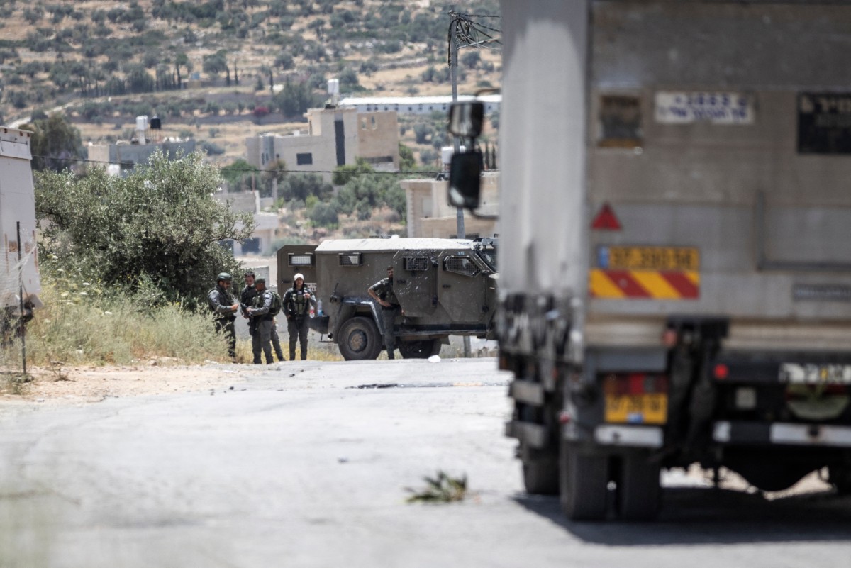 The Israeli-occupied West Bank and nearby Israeli towns witnessed several simultaneous shooting incidents on Sunday, leaving at least one man dead and four others wounded, according to Israel’s rescue services. (AFP)