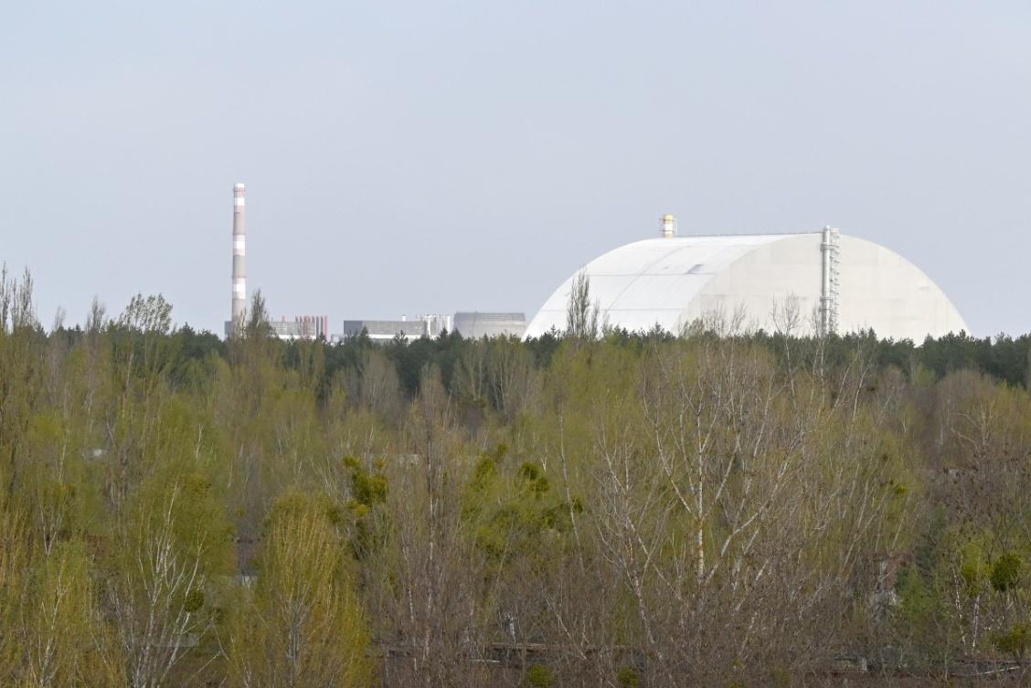 Above, the New Safe Confinement, which covers the destroyed fourth reactor at the Chernobyl Nuclear Power Plant on April 23, 2026. (AFP file photo)
