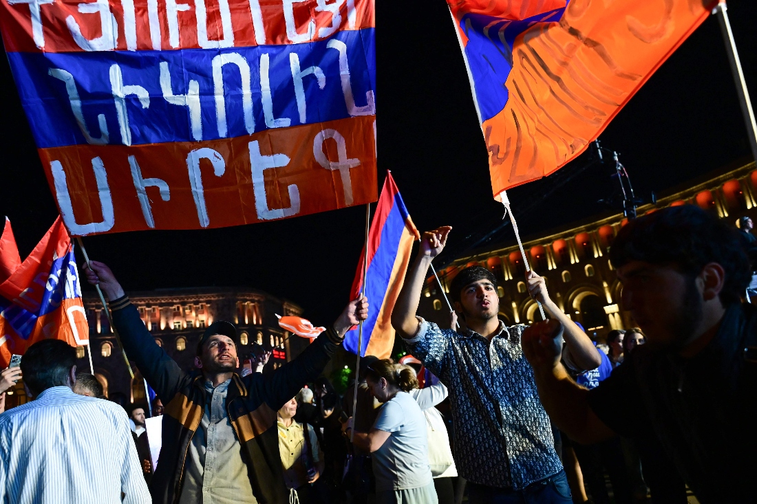Supporters of Armenian Prime Minister Nikol Pashinyan's Civil Contract party rally in central Yerevan, Armenia. (AFP)