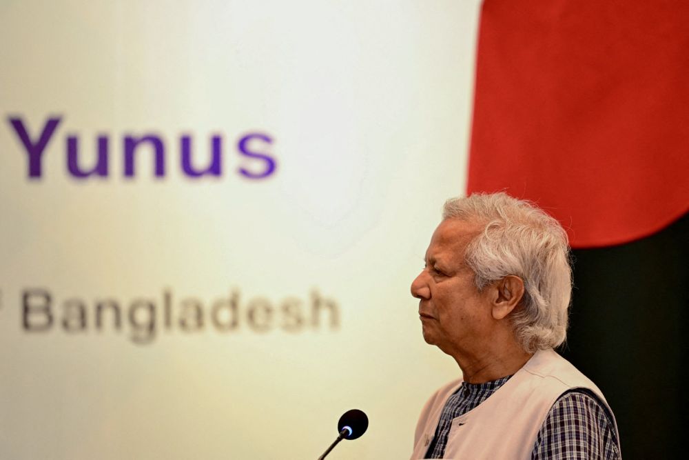Bangladesh’s then chief adviser of the interim government, Muhammad Yunus, attends a joint press conference with Malaysian PM Anwar Ibrahim, in Dhaka on Oct. 4, 2024. (AFP)