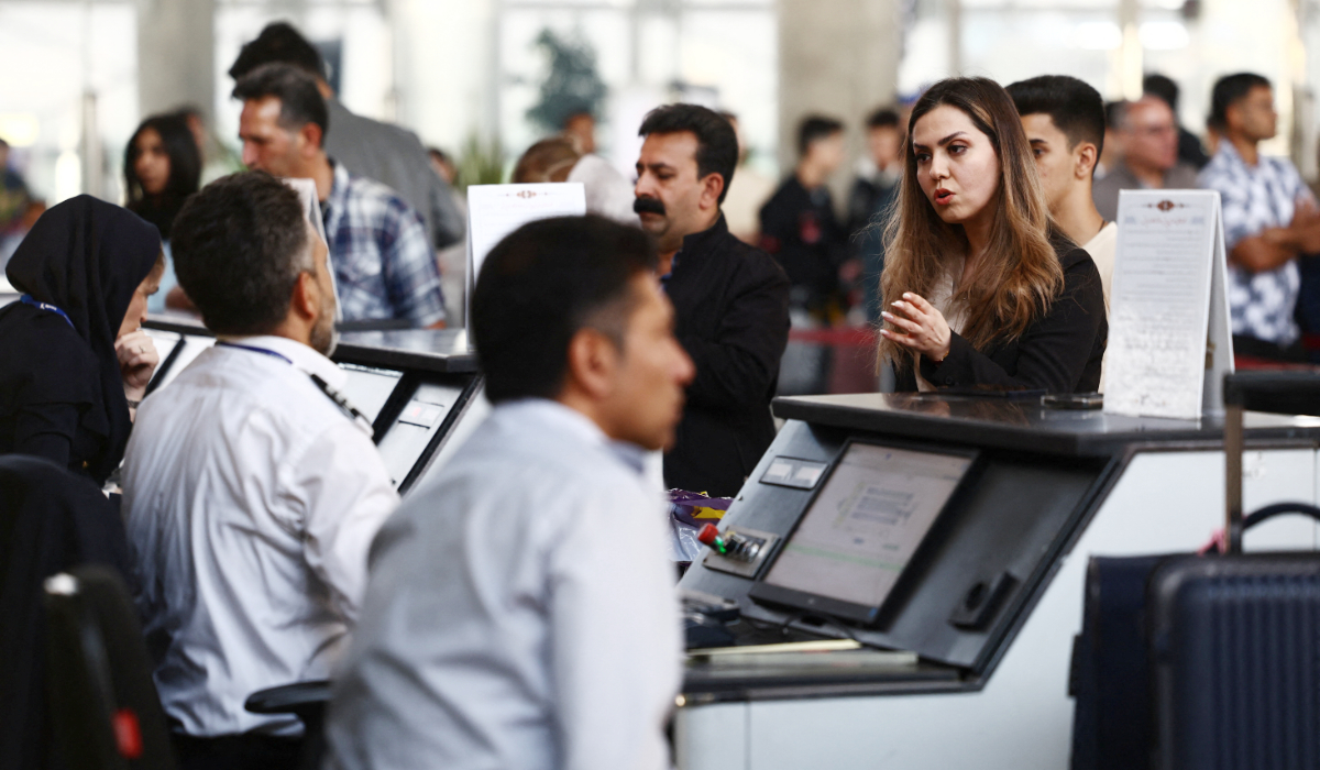 Passengers at the terminal hall after flights resumed at Imam Khomeini International Airport, amid a ceasefire between US and Iran, in Tehran, Iran, April 25, 2026. (REUTERS)