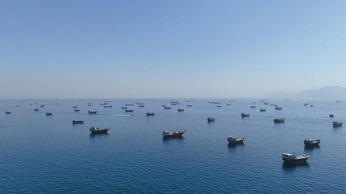 A drone view of vessels anchored in the Strait of Hormuz as seen from Musandam, Oman, on Monday. (Reuters)