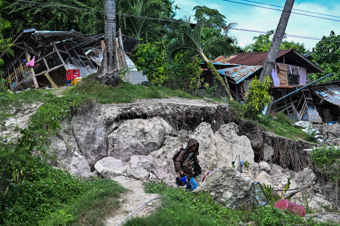 The earthquake injured at least 630 people and damaged more than 3,100 houses, 29 roads, 11 bridges and more than 100 government buildings. (Reuters)