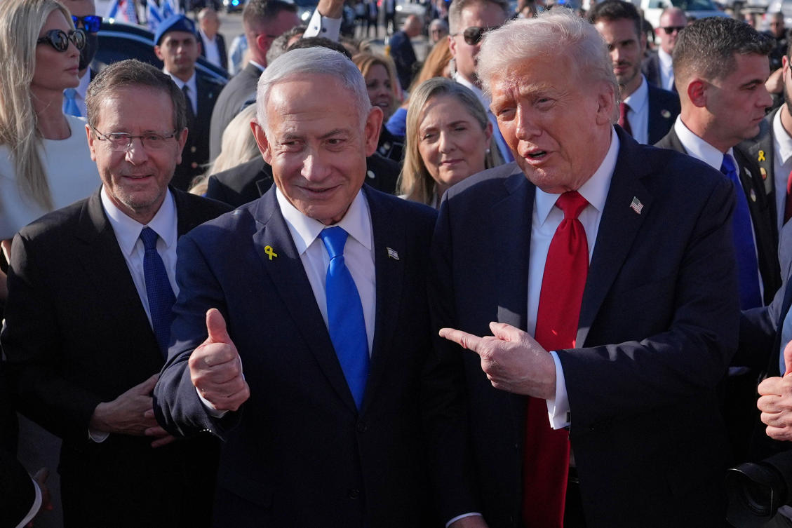 FILE - President Donald Trump poses for a photo with Israel's Prime Minister Benjamin Netanyahu before he boards Air Force One at Ben Gurion International Airport, Oct. 13, 2025, near Tel Aviv, as Israel's President Isaac Herzog watches at left. (AP Photo/Evan Vucci, File)