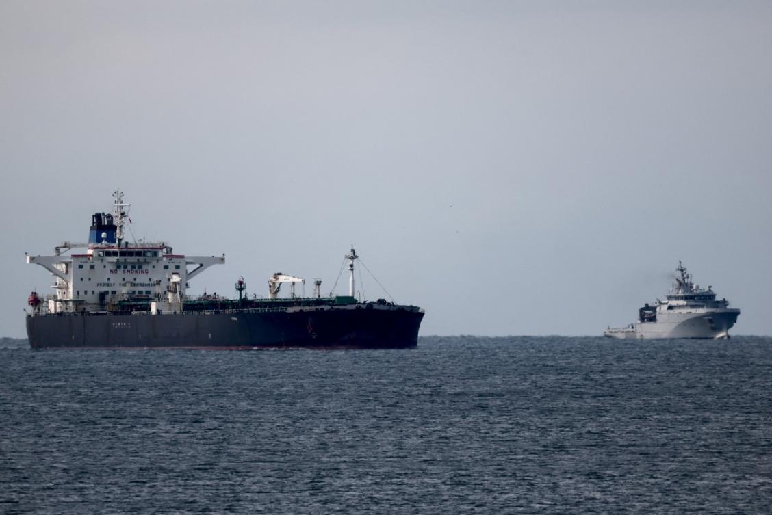 The Mozambican-flagged oil tanker "Deyna", suspected of belonging to the Russian's shadow fleet, is seen outside the coast of Martigues near the port of Marseille-Fos on Mars 23, 2026, as it's surveilled by the French Navy.(AFP)