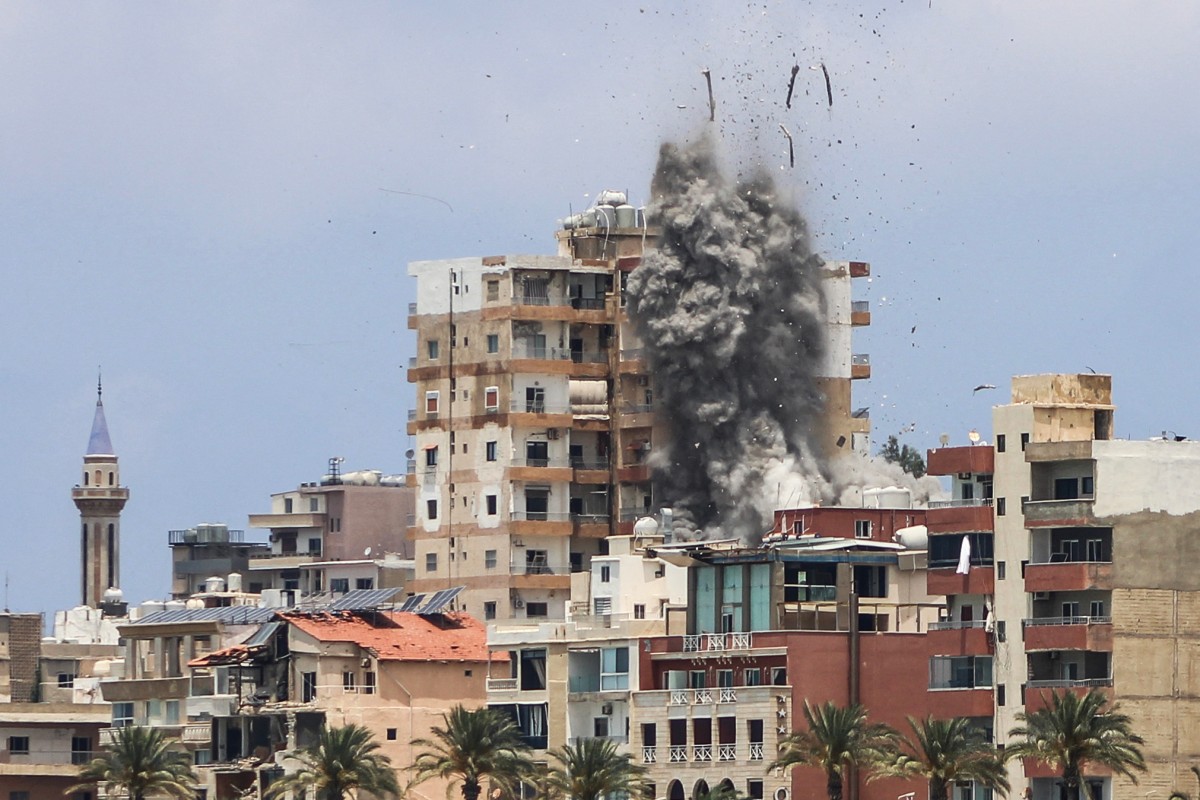 Smoke and debris rise following an Israeli airstrike in Tyre on June 9, 2026. (File/AFP)