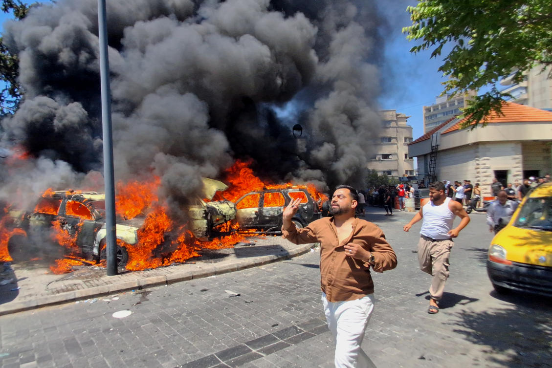 Residents run for safety following an Israeli airstrike in the southern port city of Sidon, Lebanon on June 10, 2026. (AP)