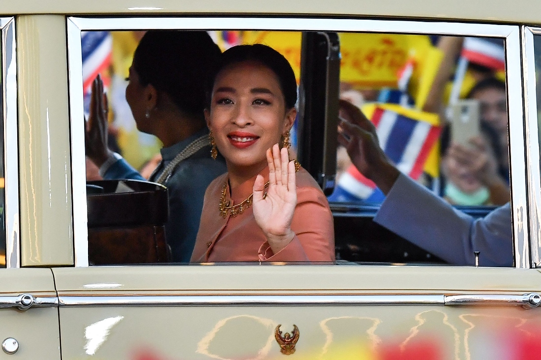 Thailand's Princess Bajrakitiyabha waves to supporters upon arrival at the Grand Palace in Bangkok, Thailand. (AFP)