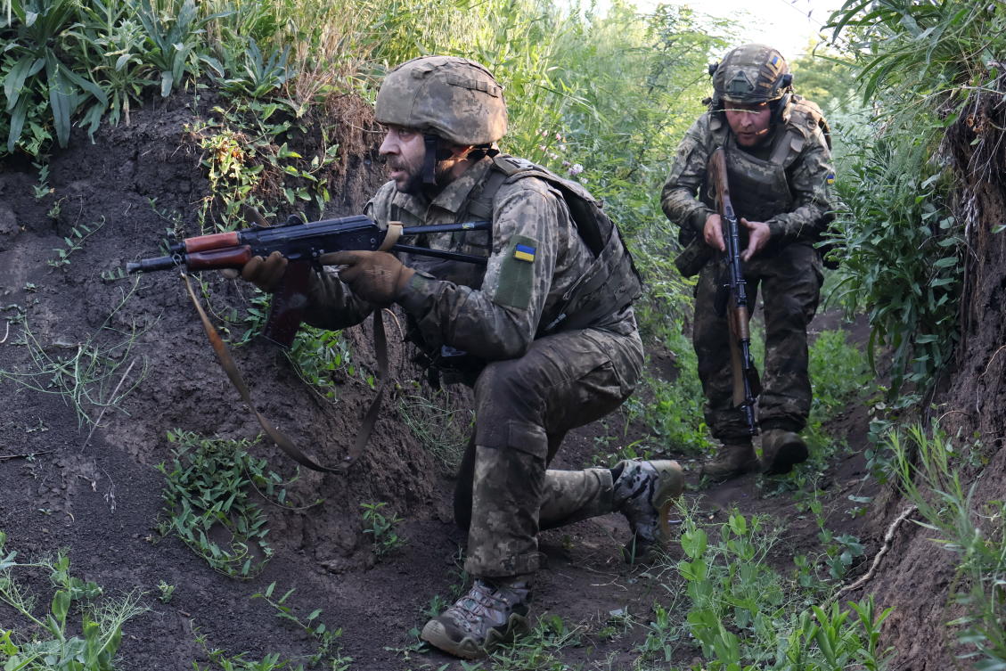 Above, Ukranian soldiers practice military skills at a training ground near the frontline in the Zaporizhzhia region on June 11, 2026. (Ukraine’s 65th Mechanized Brigade via AP)