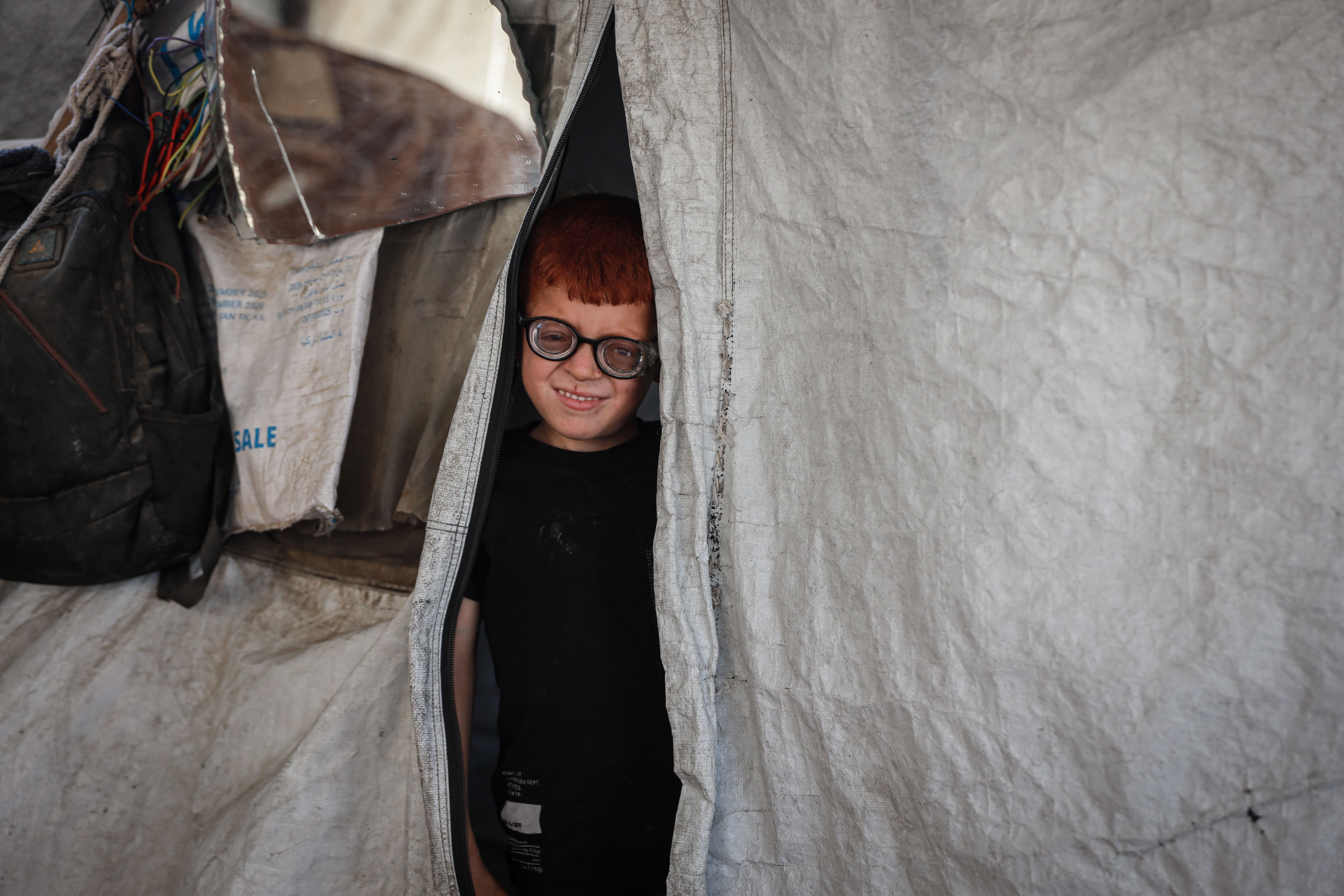 Gaza boy, 7, with visual impairments crying over broken glasses fuels anger over Israel’s blockade