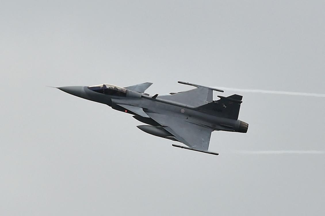 A Royal Thai Air Force JAS 39 Gripen fighter jet maneuvers during a show at Chulaporn military camp opened to the public for Thailand's National Children's Day in the southern province of Narathiwat on January 10, 2026. (FILE/AFP)