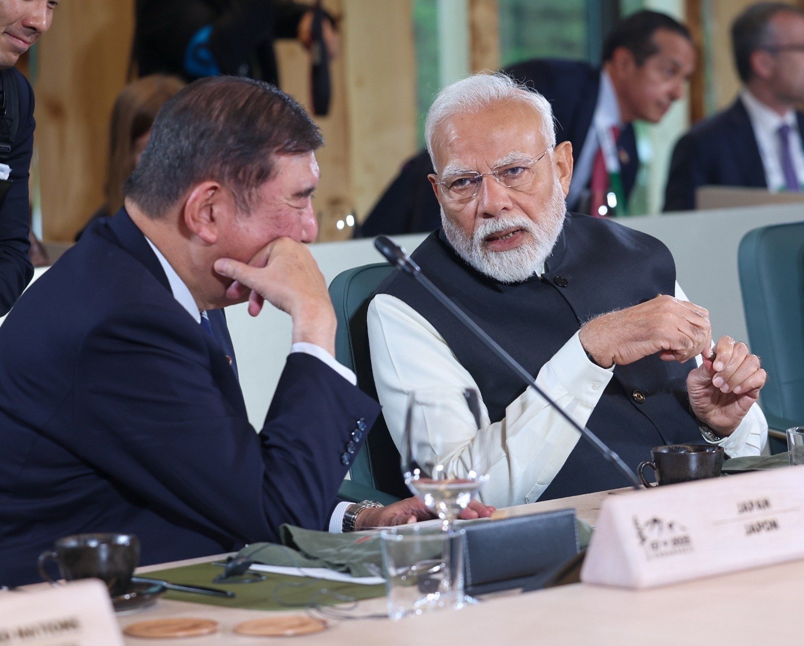 In this file photo, Indian Prime Minister Narendra Modi talks with former Japan Prime Minister Shigeru Ishiba during the Group of Seven Summit in Canada on June 18, 2025. (Prime Minister's Office)