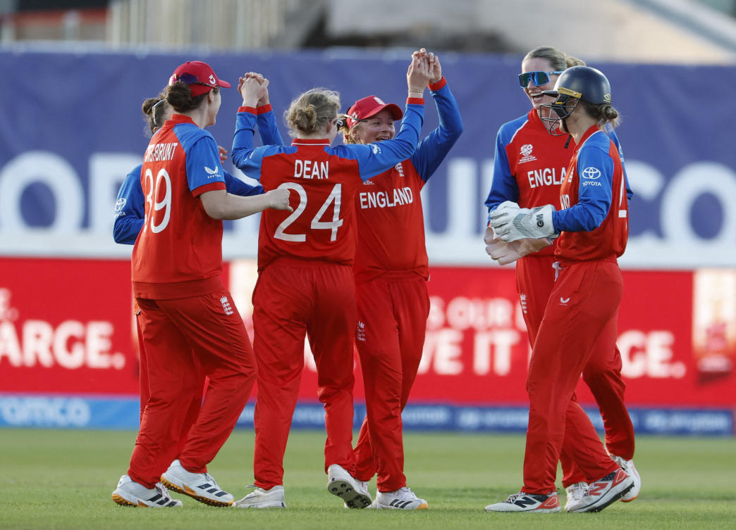 England’s Danni Wyatt-Hodge celebrates with teammates after taking a catch to dismiss Chamari Athapaththu off the bowling of Charlie Dean during their ICC Women’s T20 World Cup 2026 match aginst Sri Lanka — Edgbaston Cricket Ground, Birmingham, Britain — Jun. 12, 2026. (Reuters)