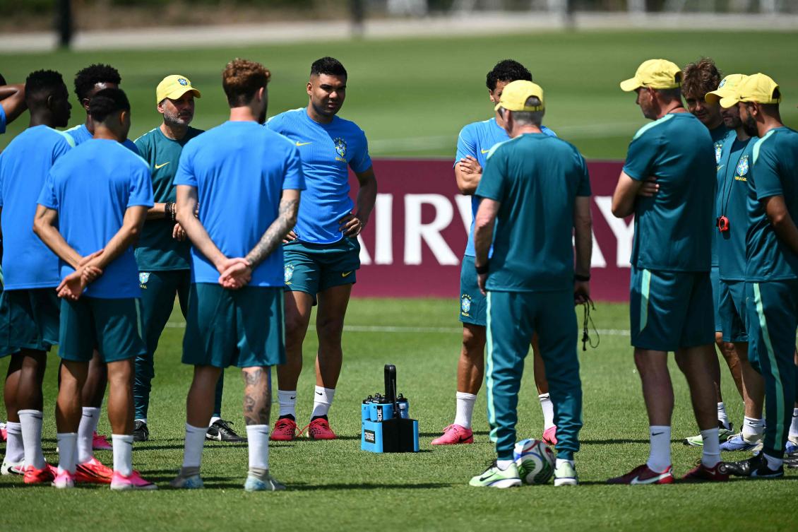 Brazil’s midfielder Casemiro and teammates listen to Italian head coach Carlo Ancelotti during an training session at the Columbia Park Training Facility in Morristown, New Jersey on Jun. 12, 2026, on the eve of their 2026 World Cup Group C match against Morocco. (AFP)