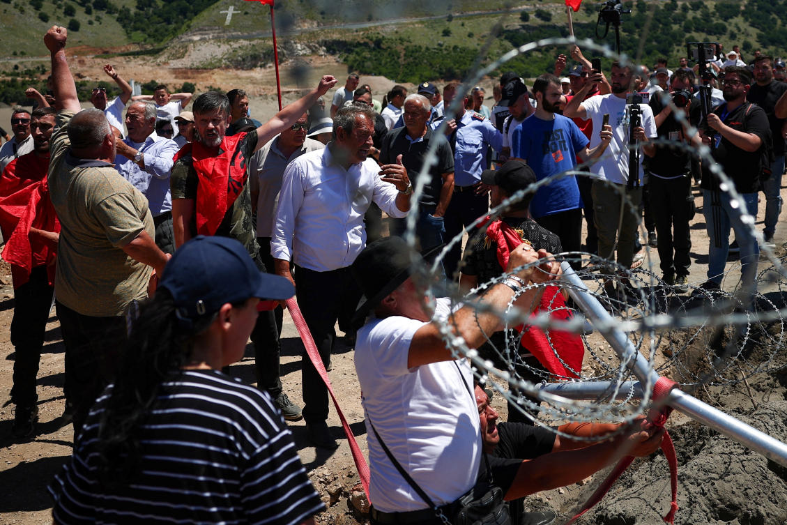 Protesters tear down Albanian development site fences, amid anger over coastal projects