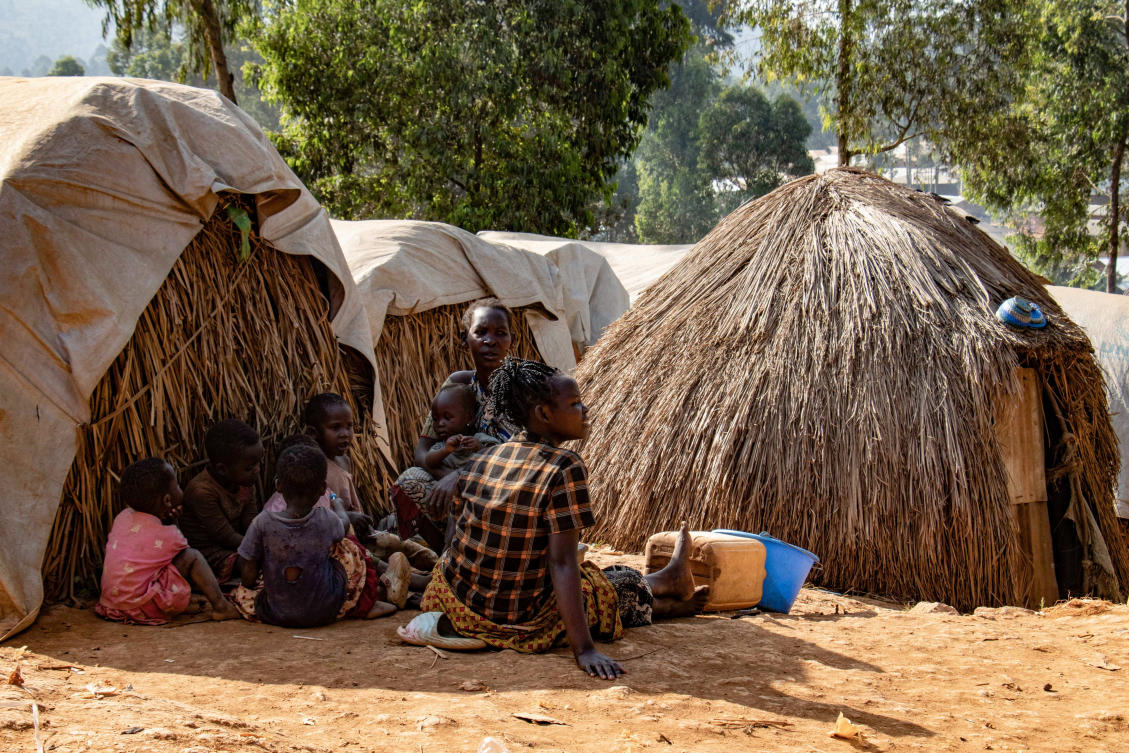 A displaced family sits during an Ebola awareness session as humanitarian agencies intensify efforts to contain a new Ebola outbreak involving the Bundibugyo strain, at Kpangba displacement camp where Ebola cases were observed. (REUTERS)