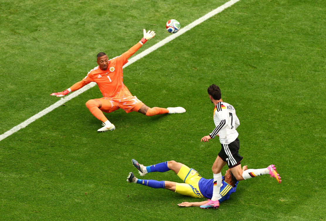 Germany's Kai Havertz scores their seventh goal past Curacao's Eloy Room (Reuters)