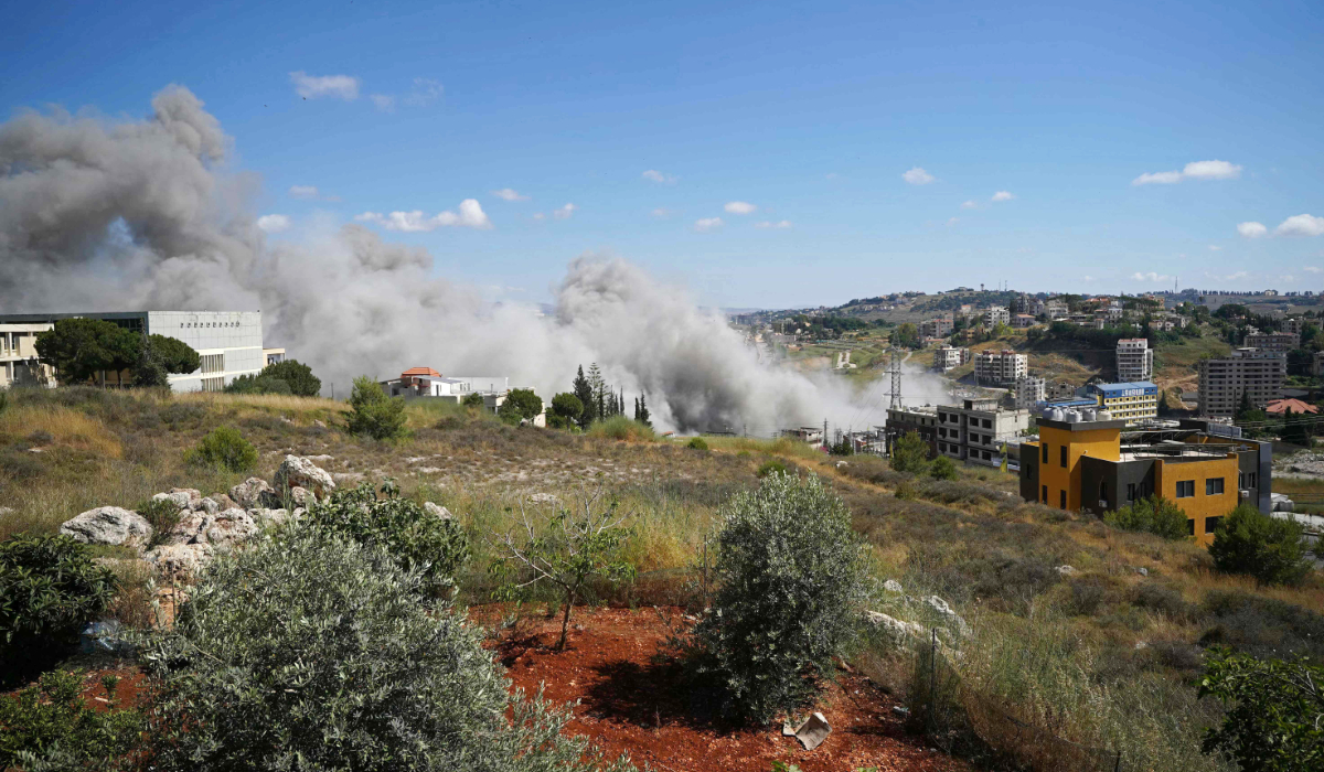 Smoke rises from the site of an Israeli airstrike that targeted the southern Lebanese village of Kfar Roummane on June 13, 2026. (AFP)