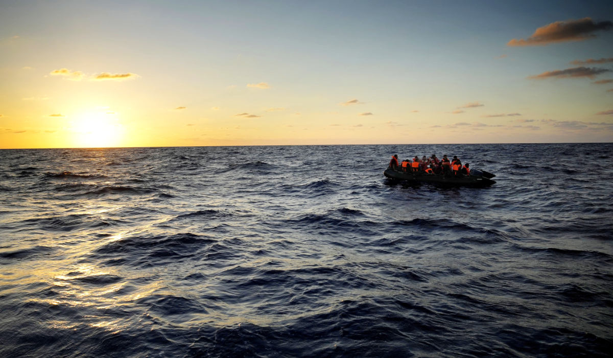 Migrants wait to be rescued by the Spanish NGO Open Arms lifeguards during a rescue operation at international waters zone of Libya SAR (Search and Rescue) in the Mediterranean sea, on Sept. 15, 2022. (AP)
